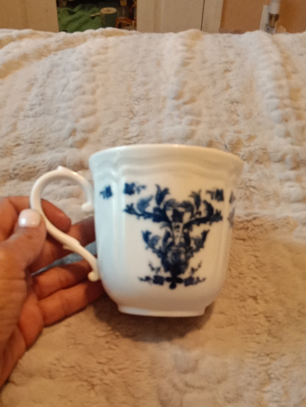 Classic White Porcelain Mug with Blue Floral Motif